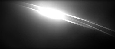 Yoğun beyaz bir ışık, koyu bir arkaplanı aydınlatarak çarpıcı bir kontrast yaratır. Mercek tek renkli sahneye derinlik kattığı için atmosfer elektrik mavisi renklerle dolu.