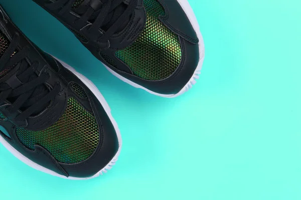 Pair of sport shoes on colorful background. copy space.