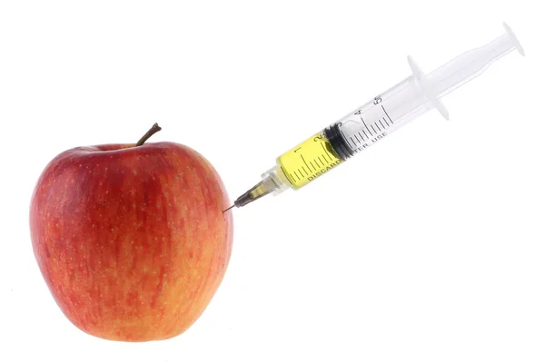アップルと白い背景の上注射器 — ストック写真