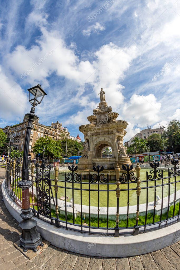 Flora Fountain and Oriental Old Buildings at blue sky
