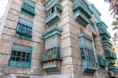 Old city in Jeddah, Saudi Arabia known as Historical Jeddah. Ancient building in UNESCO world heritage historical village Al Balad. clipart