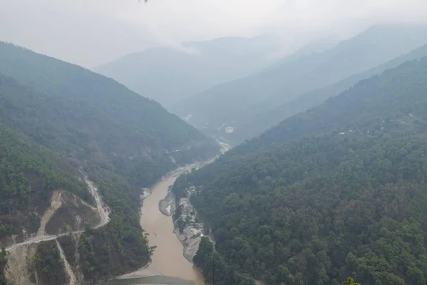 Top view of lovers point where the river coming from left is Rangeet and meeting Teesta which is coming straight down. West bengal india.
