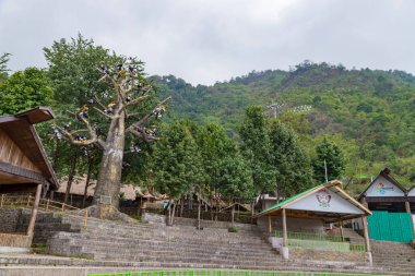 Kohima, nagaland India  9 may 2022.Traditional house in naga heritage village, Kohima, Nagaland, north-east India clipart