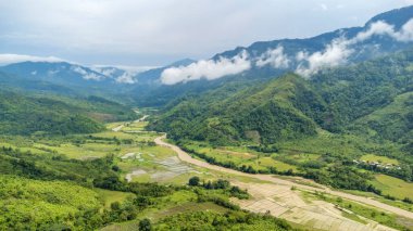 Aerial view of beautiful mountain valley in nungba near longsai village and leimatak river.Nature landscape image of manipur in india. clipart