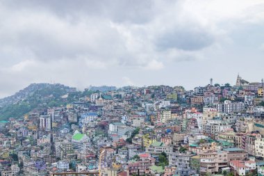 View over the houses perched on the hills in aizawl, mizoram, India, asia clipart