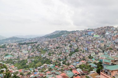 The aizawl city capital of mizoram View over the houses and building on the hills in aizawl, mizoram, India, asia clipart