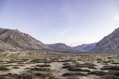 Beautiful himalayan mountain at dhar sajam road to ladakh with glacier on the top of the mountain in the evening at dhar sajam, himachal pradesh, India clipart