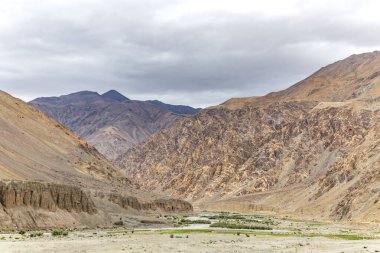 Beautiful mountain landscape at Loma with Indus River in Ladakh, situated on the border with India and China, Leh, Ladakh, India. clipart