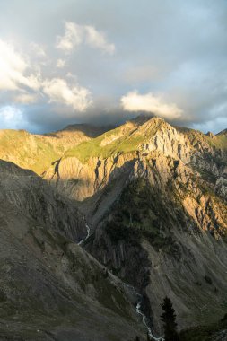 Beautiful Himalayan mountain landscape view of Baltal on Zoji La Pass with Sindh River in the Srinagar-Leh road in Jammu and Kashmir, India. clipart