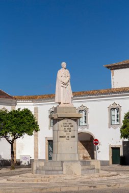 Faro, Portugal - October 3, 2020: statue of the bishop Francisco comes do Avelar at the market square in Faro, Portugal.background, Portugal