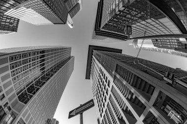 Frankfurt, Germany - February 8, 2023: fisheye perspective of skyscraper downtown financial district in Frankfurt, Germany.
