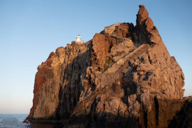 small island of strombolicchio, a tiny volcanic island next to the volcanic island stromboli in Italy