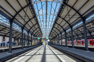 Wiesbaden, Germany - February 27, 2023: old historic train station in Wiesbaden from the 19th century in a beautiful industry architecture and still in use.