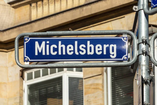 old enamel street name sign Michelsweg - engl:  Michaels way - in Wiesbaden, Germany.