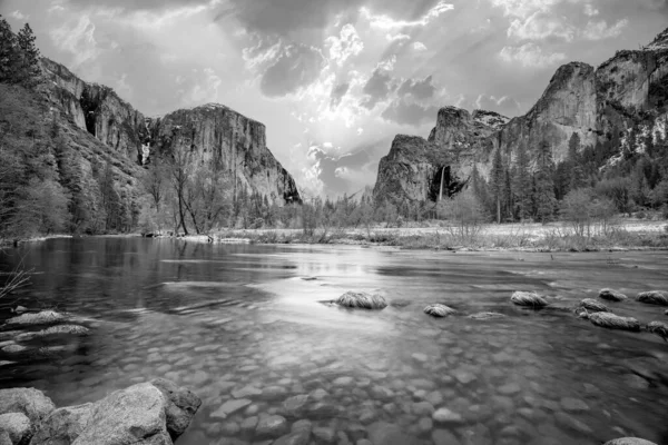 stock image beautiful view in Yosemite valley with half dome and el capitan in winter from merced river