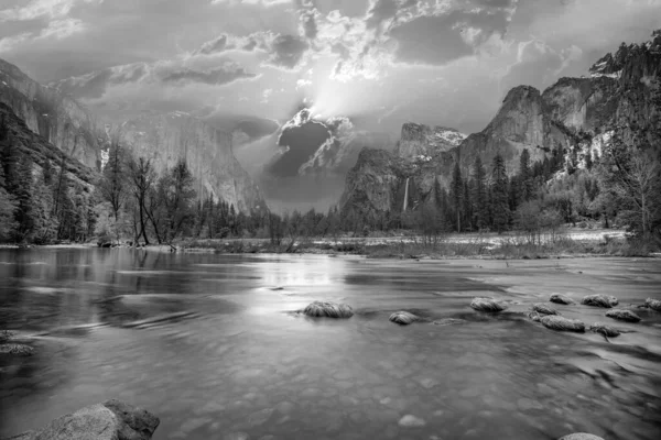 stock image beautiful view in Yosemite valley with half dome and el capitan in winter from merced river