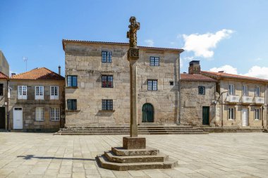 Pontevedra, Spain - September 3, 2021: La Plaza de la Lena in Pontevedra, Galicia, Spain with statue.