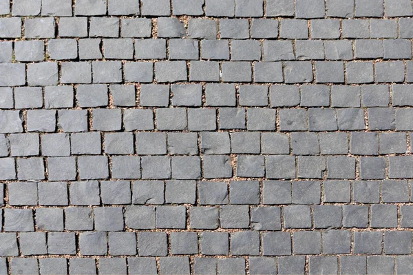 列の灰色の石の調和のとれたパターン — ストック写真