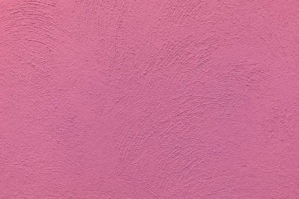 明るい色のピンク色の石膏壁の背景 — ストック写真