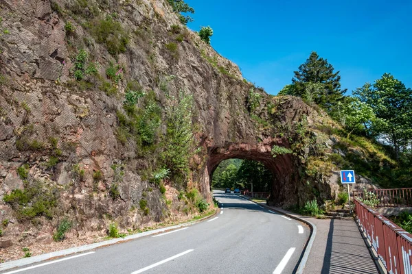 stock image scenic, devils rock iwith street tunnel n the vosges region of france, Europe