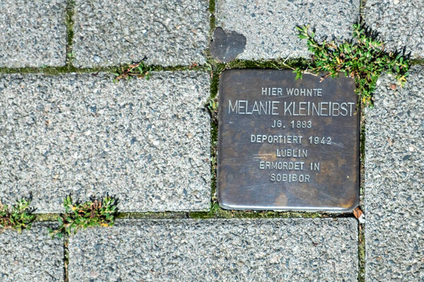 Wiesbaden, Germany - August 10, 2023: Stolperstein (Stumbling Block) in Wiesbaden memorials on the pavements to victims of Nazi oppression.