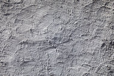 Almanya 'da gri alçı duvar arka planının harmonik deseni