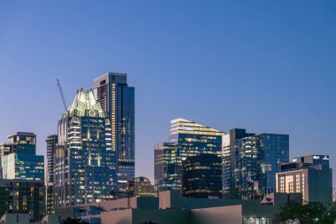 Austin, USA - November 2, 2023: view to skyline of Austin from highway 35 by night. clipart