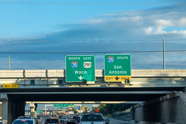 stock image Austin, USA - November 2, 2023: traffic sign waco and san Antonio in Austin with exit only at highway 35, Austin, TEXAS, USA.