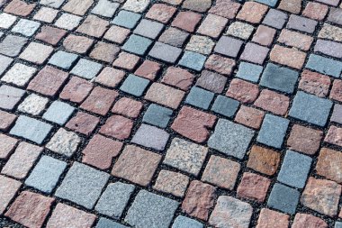 Kaldırımdaki renkli kaldırım taşı deseninin ayrıntıları