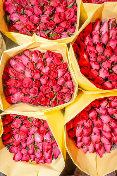 red roses offered at the night flower market in Bangkok