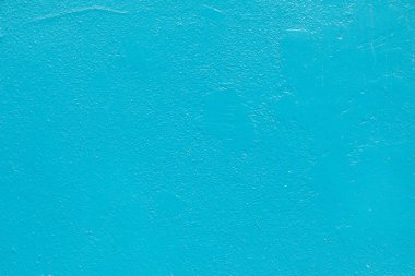 Yumuşak alçı yapısı olan mavi boyalı duvar deseni