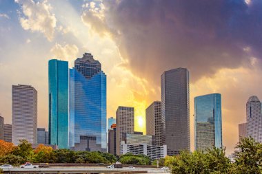 scenic skyline of Houston, Texas in morniong light seen from Buffalo bayou park clipart