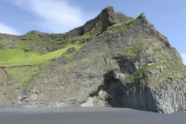 stock image scenic vertical basalt columns at Reynisfjara, the famous black beach in Iceland, near Vik  Myrdal, form a perfect geometric background pattern