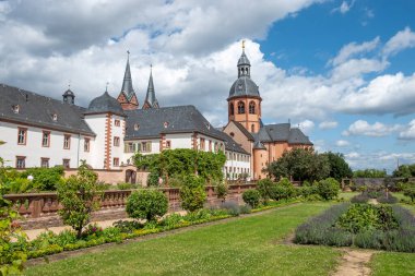 wiew to cloister garden of famous cathedral in Seligenstadt, Germany clipart