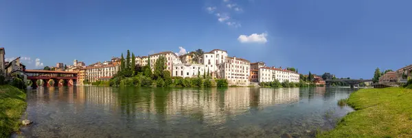 stock image view from the Old Bridge in Bassano del Grappa, also called ponte degli Alpini to historic skyline of Bassano di Grappa, Italy