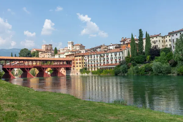 stock image view to historic skyline of Bassano del Grappa with the Old wooden Bridge, also called ponte degli Alpini, Italy