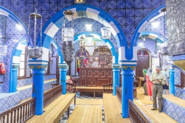 Erriadh, Tunisia - May 2, 2024: ,  inside view of historic El Ghriba synagogue in Erriadh, on Djerba island. It is the oldest synagogue in Tunesoa, Djerba. clipart