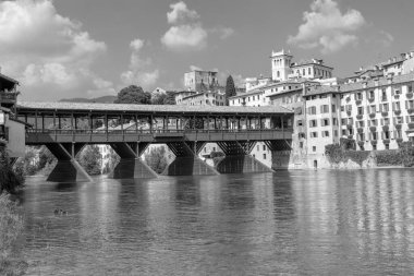 Bassano di Grappa, Italy - July 9, 2024: view to the Old Bridge in Bassano del Grappa, also called ponte degli Alpini, Italy. clipart