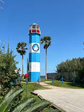 Kemah, USA - August 14, 2024: aerial of  Kemah Lighthouse under blue sky on 6th St. in Kemah Texas. clipart