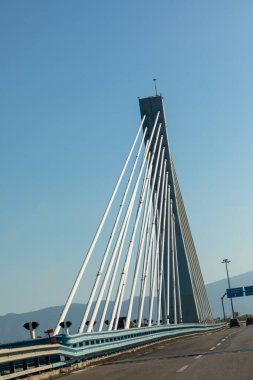 scenic modern bridge at ss7 via Domi ziana in Monturno, Italy clipart