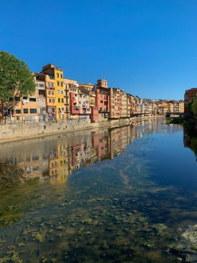 Famous colorful houses at river Onyar in Girona, Catalonia, Spain clipart