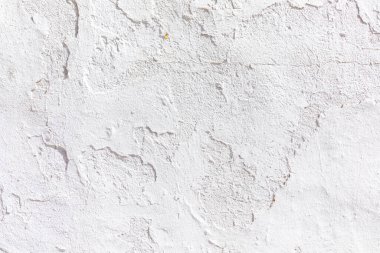 Tipik Akdeniz tarzı beyaz alçı duvar deseni, eski bir evin duvarı, harmonik yapı.