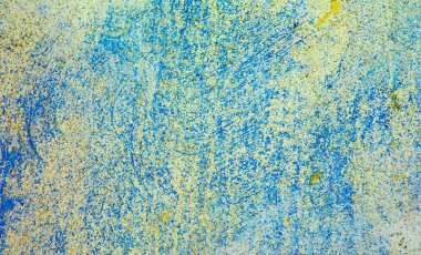 Duvar kağıdını grunge ve zamanın sembolü olarak farklı tarihsel renklerle kaldırdıktan sonra alçı duvarın deseni