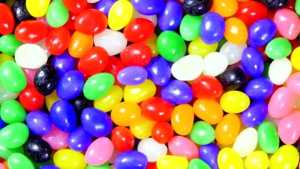 Rotating Bowl Colorful Easter Jellybeans Use Seasonal Background Placement Copy — Stock Video
