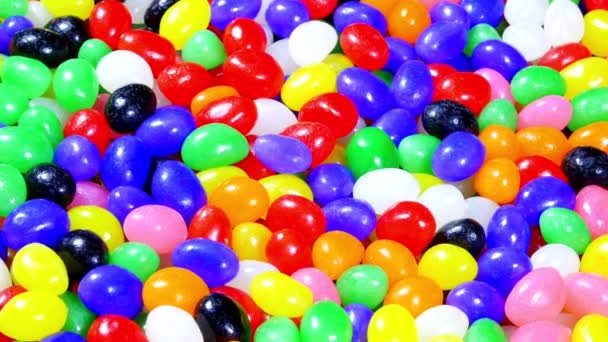 Rotating Bowl Colorful Easter Jellybeans Use Seasonal Background Placement Copy — Stock Video