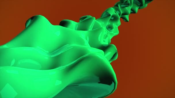 オレンジ色の勾配背景に対して3次元液体の緑の流れ — ストック動画