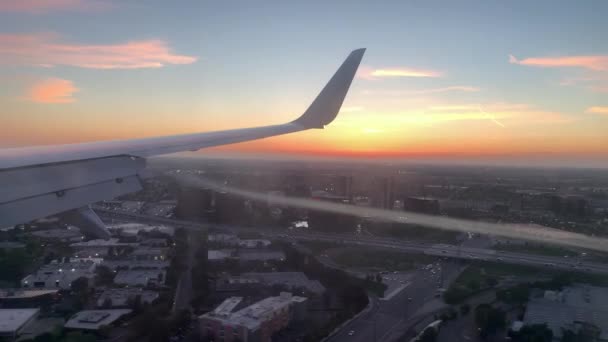 Commercial Passenger Airplane Flying City Sunset Prepares Land Nearby Airport — Stock Video