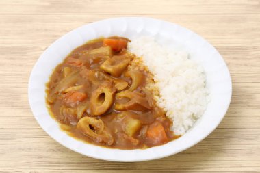 Close up of Japanese curry rice with chikuwa on table background clipart