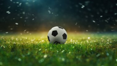 Yumuşak çimenlerin futbol stadyumu, futbol topunun yakın plan görüntüsü..
