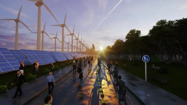Människor Som Går Mot Grön Stad Vid Solnedgången Elektrifieras Vindkraftverk — Stockvideo
